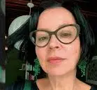 Foto de cliente satisfeita